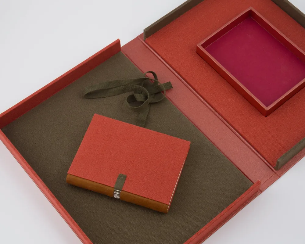 Red gift box with a matching book